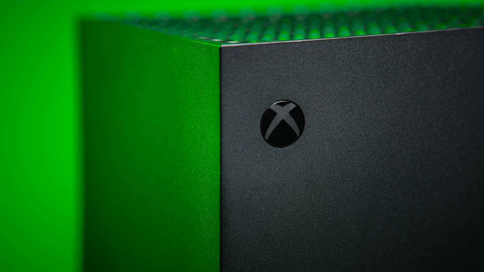 An Xbox console opened on the repair bench